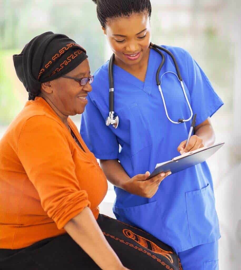 Nurse showing patient charts.