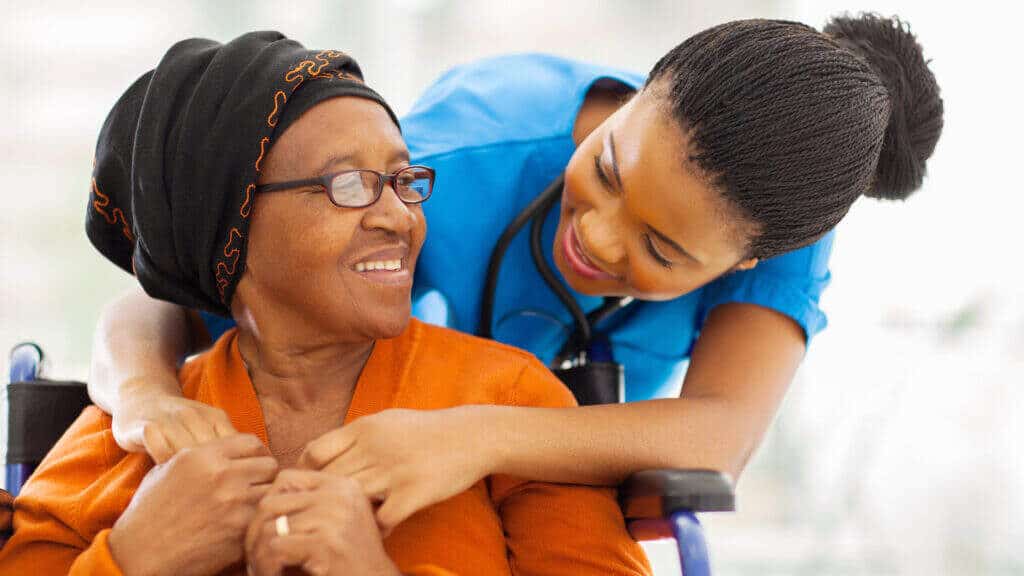 nurse with elderly patient.