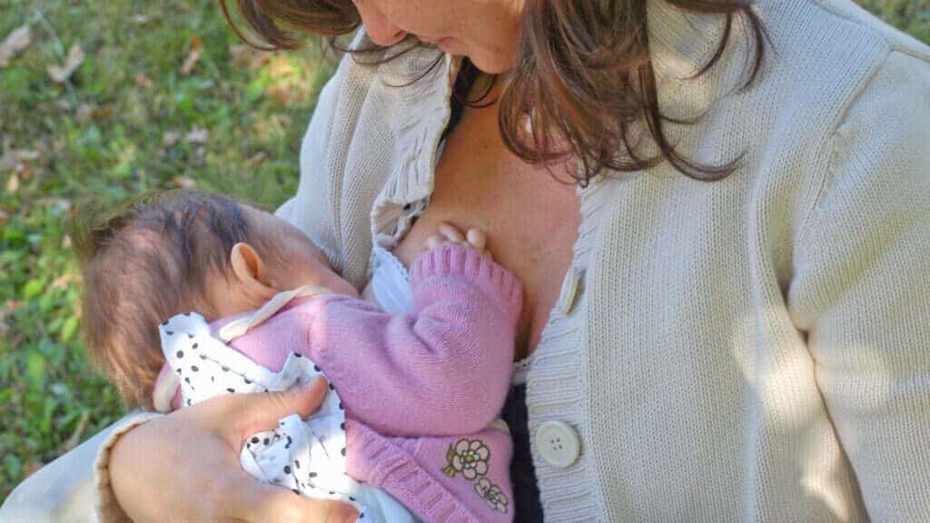 woman breastfeeding.