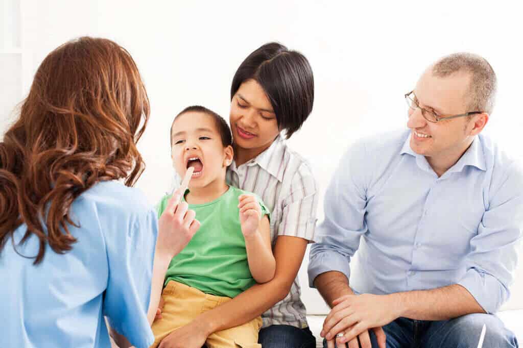 pediatric patient with parents.